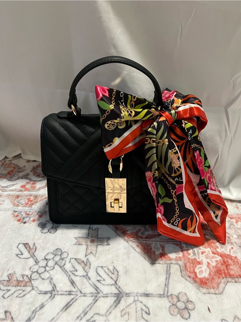 ALDO Black Quilted Top-Handle Bag with Decorative Scarf